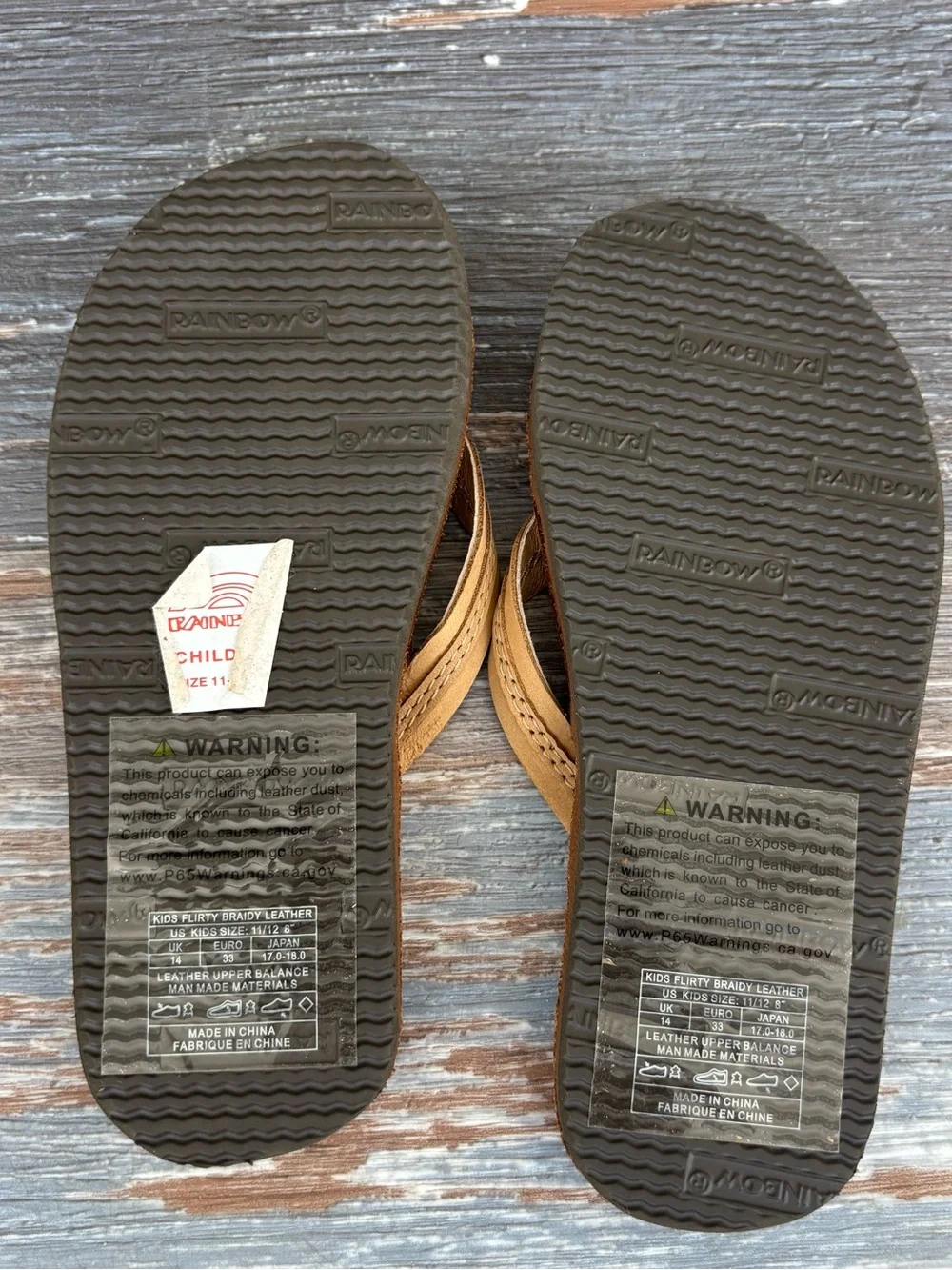 New Rainbow flirty braidy Kids Tan Flip Flops size 11/12